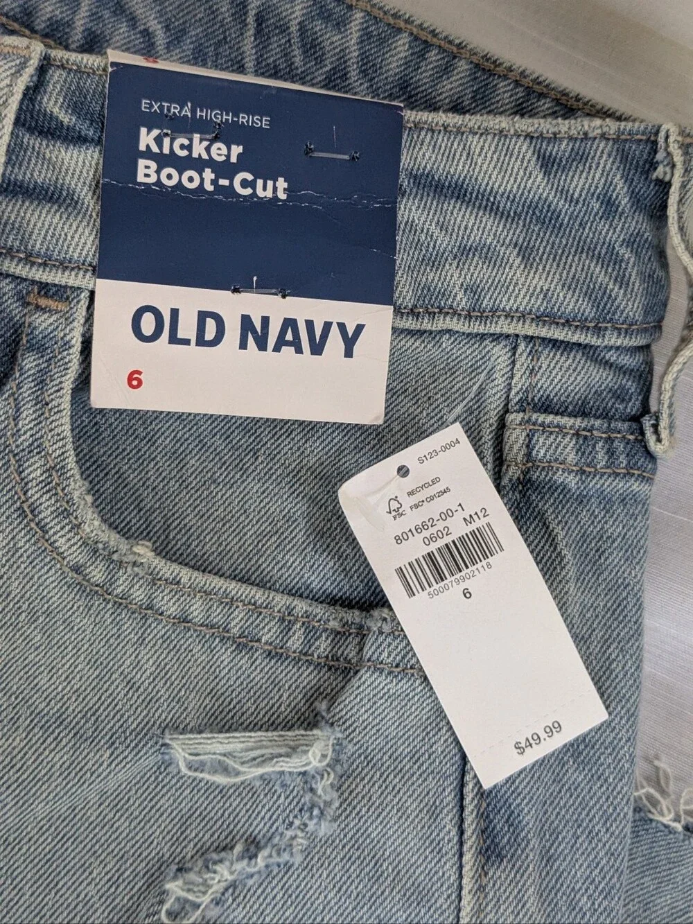 Old Navy Kicker Boot-Cut jeans featuring a light wash and distressed Sz 6